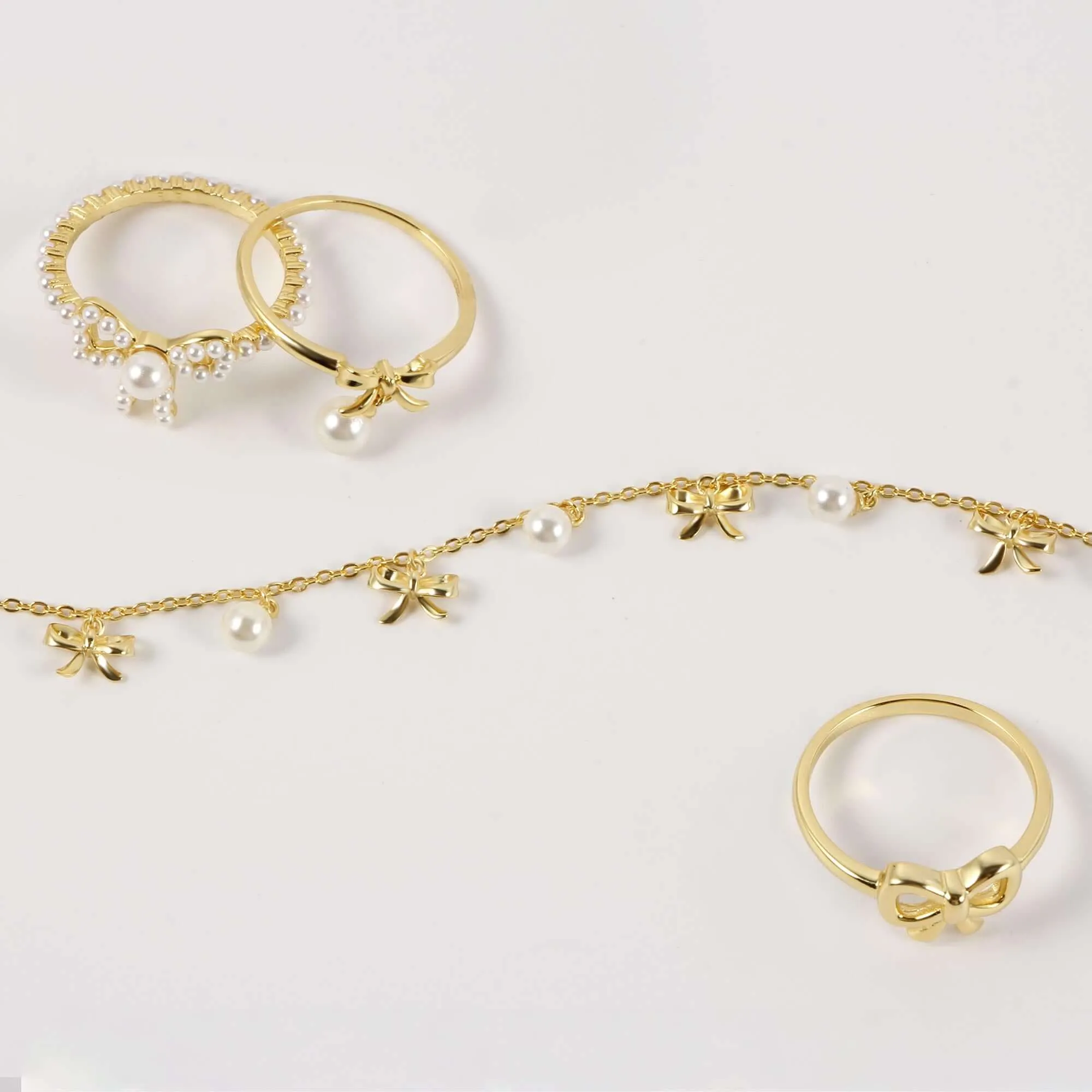 Dainty Pearl Encrusted Bow Ring