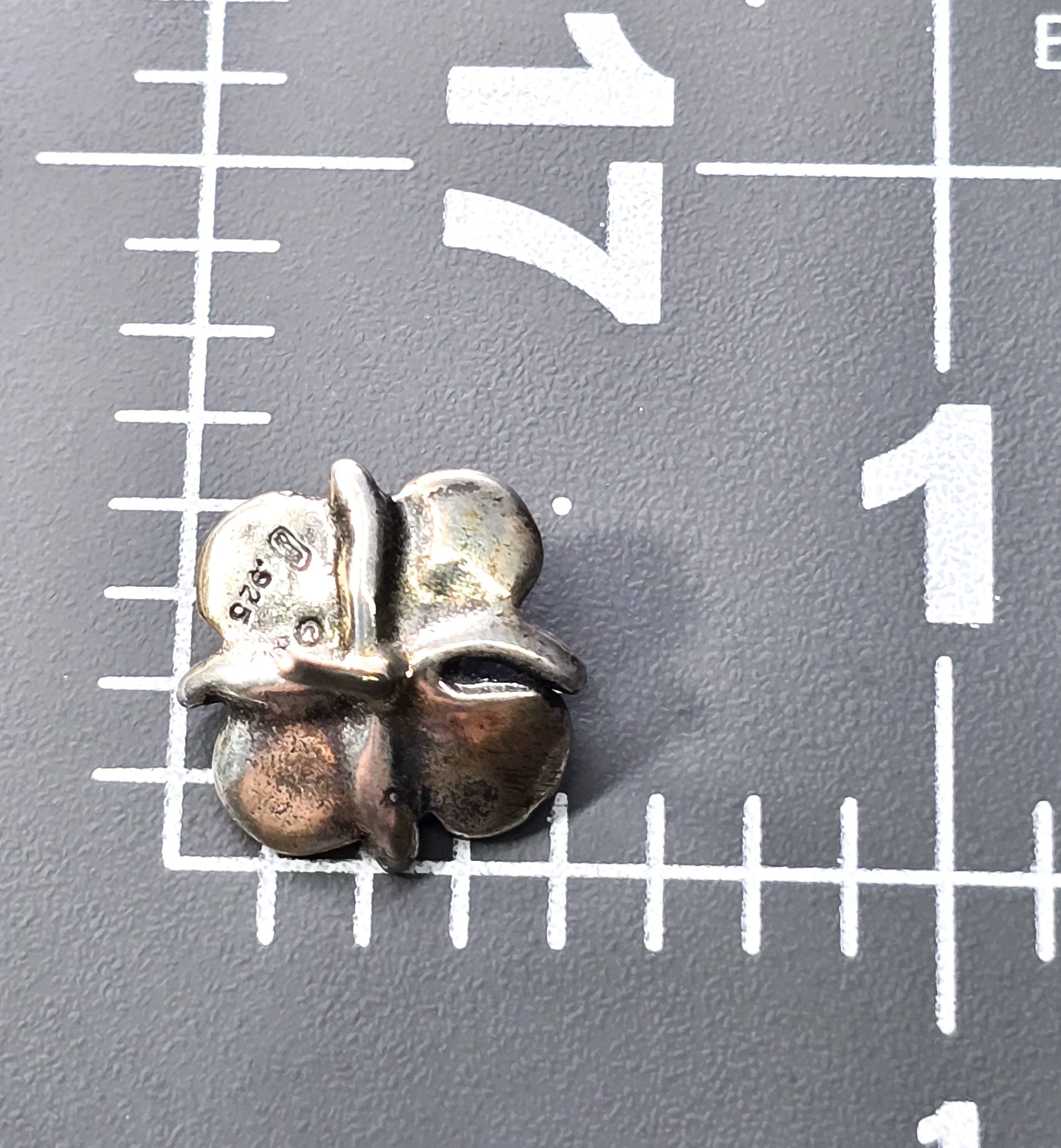 Flower stud detailed signed sterling silver four petal stud earrings