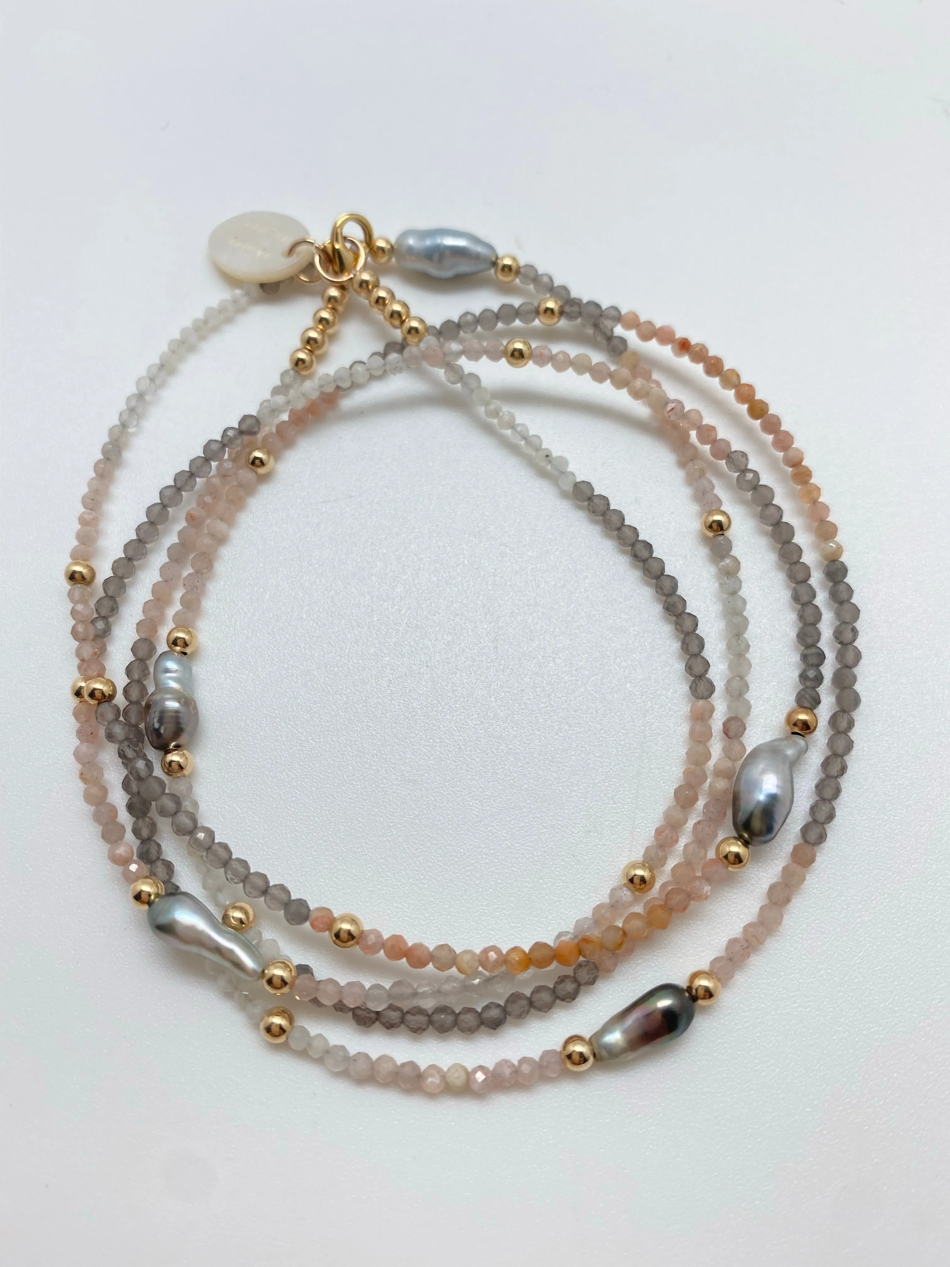 N  long  5 Keshi beads