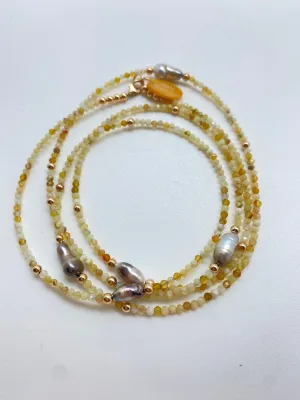 N  long  5 Keshi beads