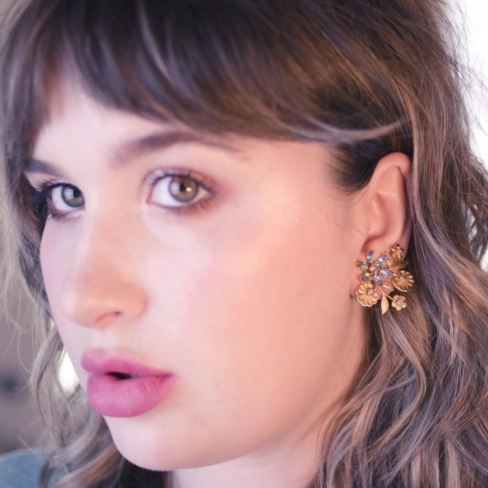 Vintage Mid Century Modern Gold Flower Earrings with Blue and Aurora Borealis Rhinestones